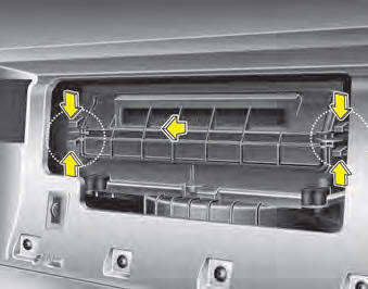 3. Remove the climate control air filter case by pulling out both sides of the